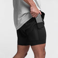 Trendy sportshorts met ademend materiaal en zijzak - Marky