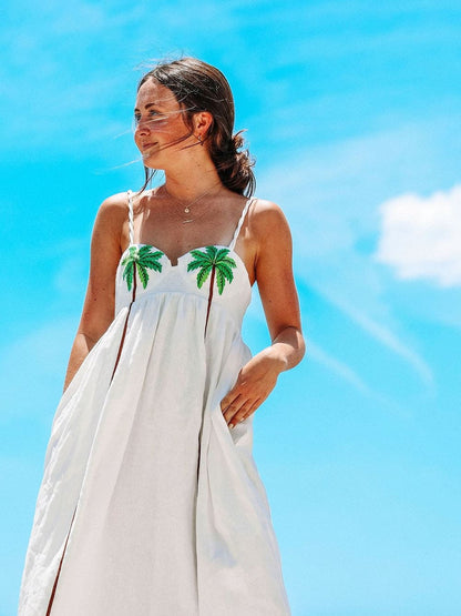 Trendy schouderjurk met tropische palmprint – Estelle