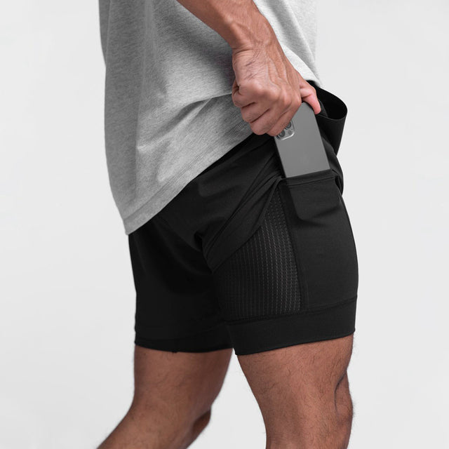 Trendy sportshorts met ademend materiaal en zijzak - Marky