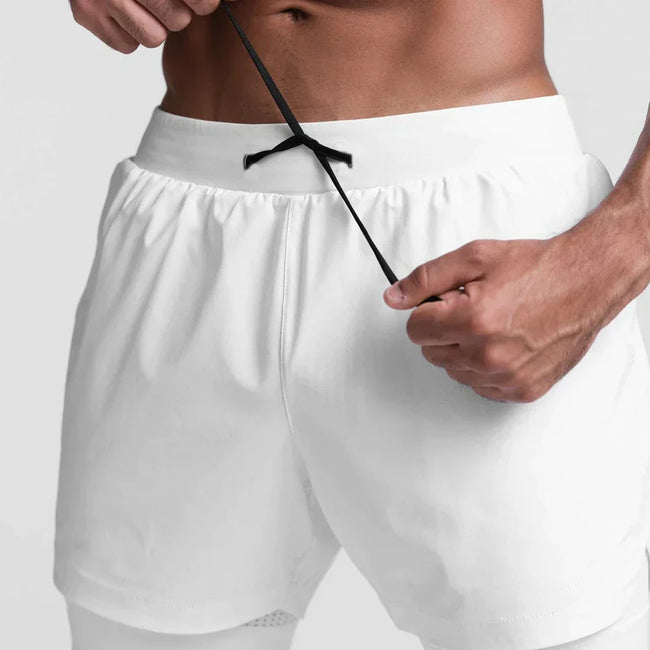 Trendy sportshorts met ademend materiaal en zijzak - Marky