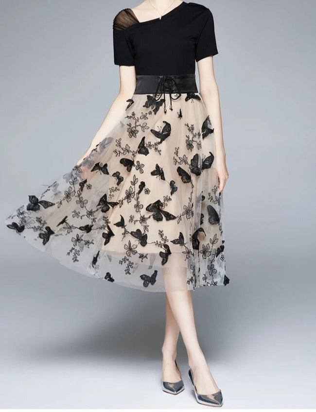 Stijlvolle midikleed van mesh met borduursel en volantmouwen – Maila