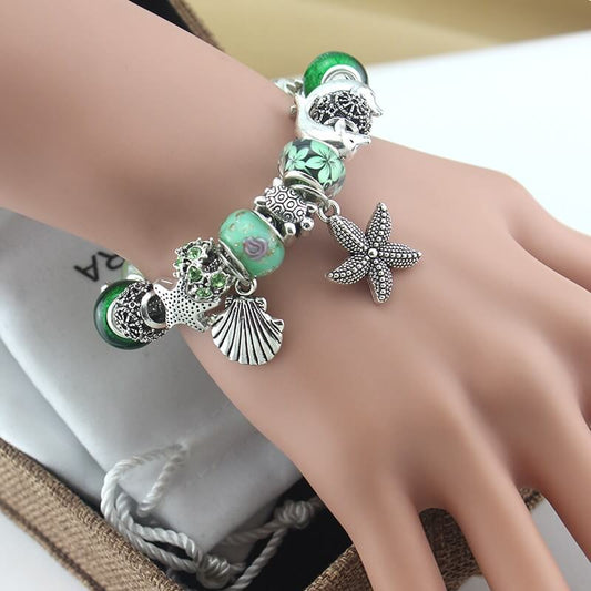 Zeeschelp en Zeester Bedel Armband